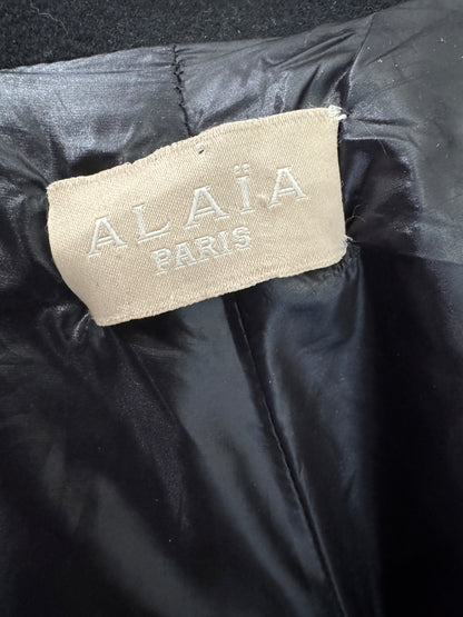 Alaia Fall 2012 ample short ruffled black wool coat