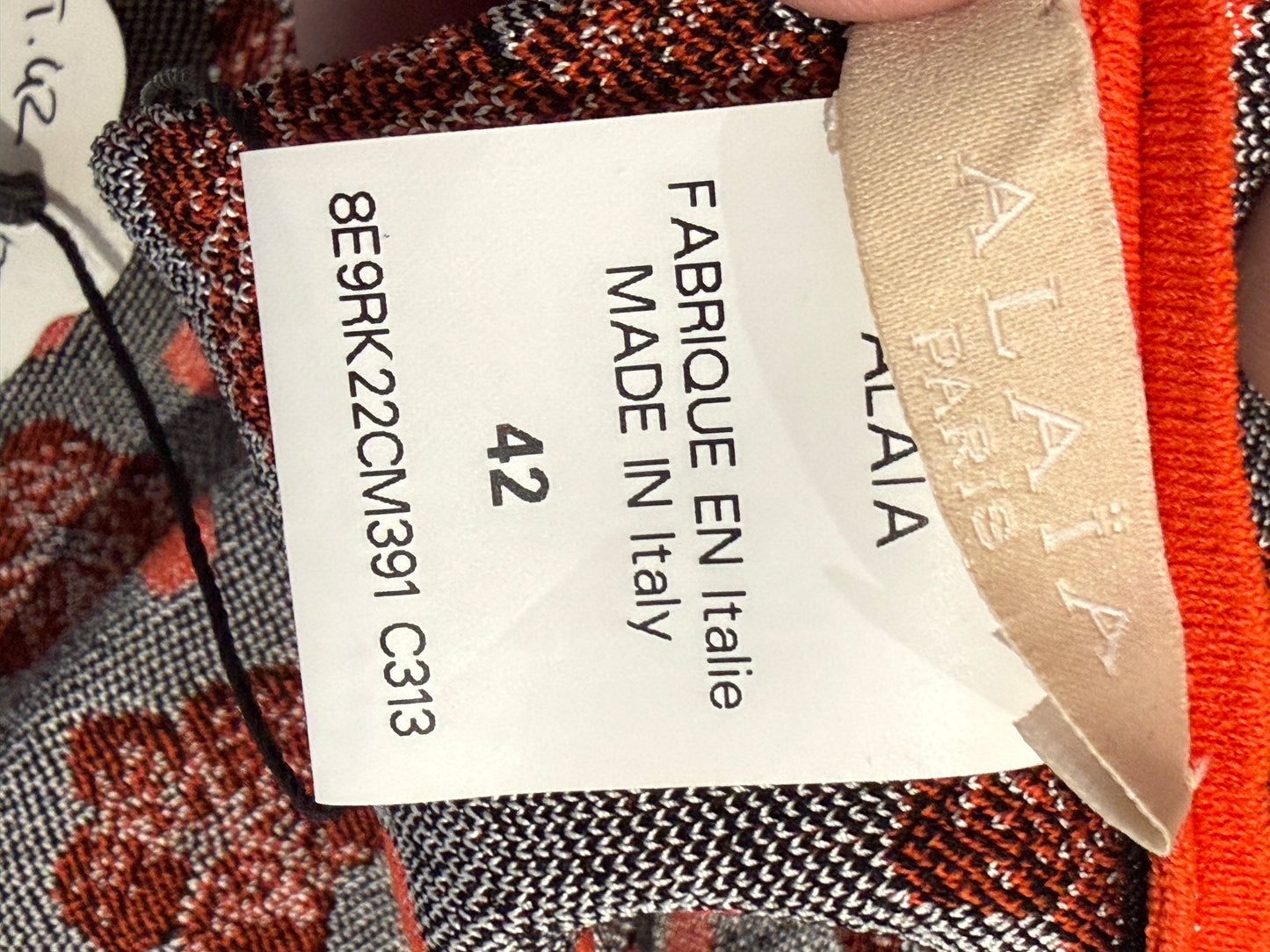 Alaia Resort 2019 orange knit skater dress