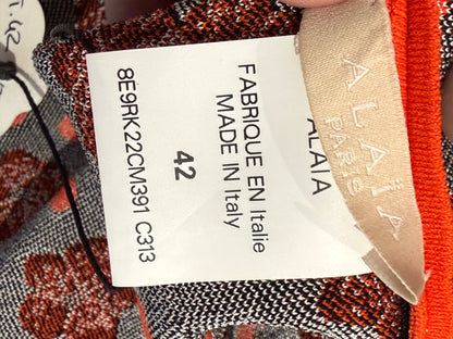 Alaia Resort 2019 orange knit skater dress