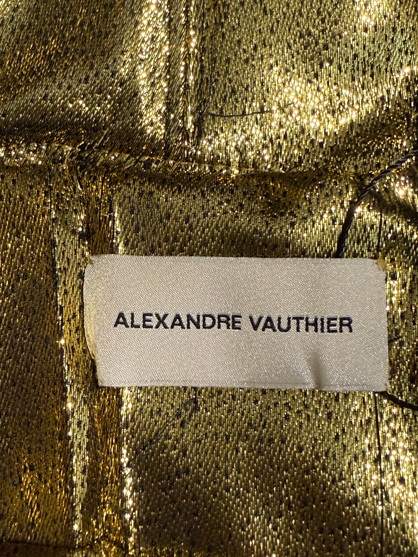 Alexandre Vauthier Spring 2024 Look 4 pleated gold dress