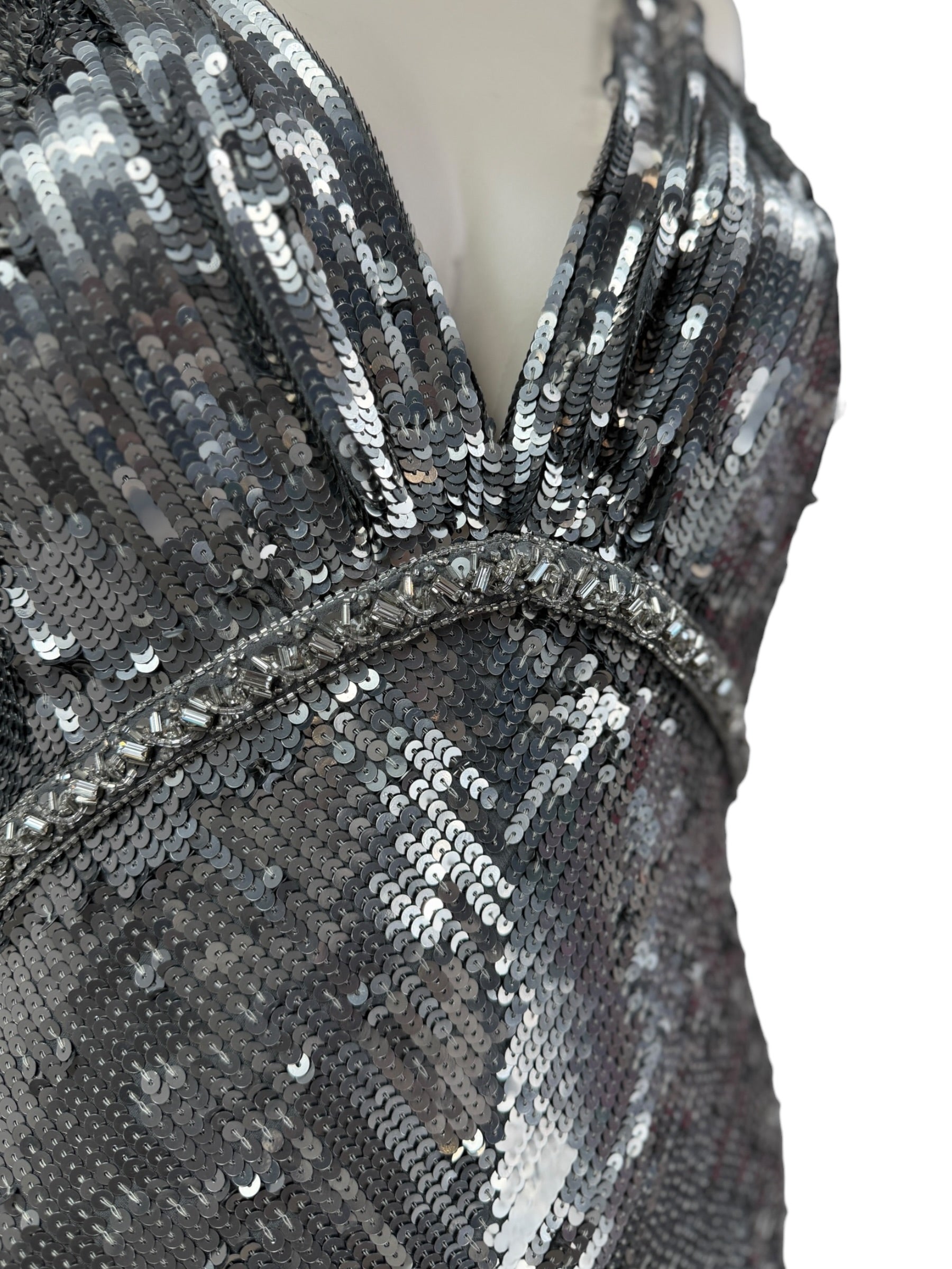 Christian_Dior_John_Galliano_Prefall_2010_Look_20_Silver_metallic_sequined_dress