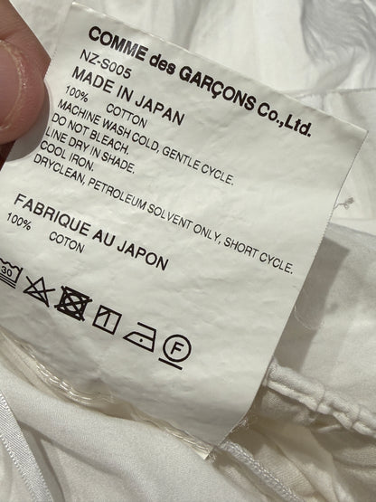Comme des Garçons 2022 - White cotton asymmetric skirt with ruffles
