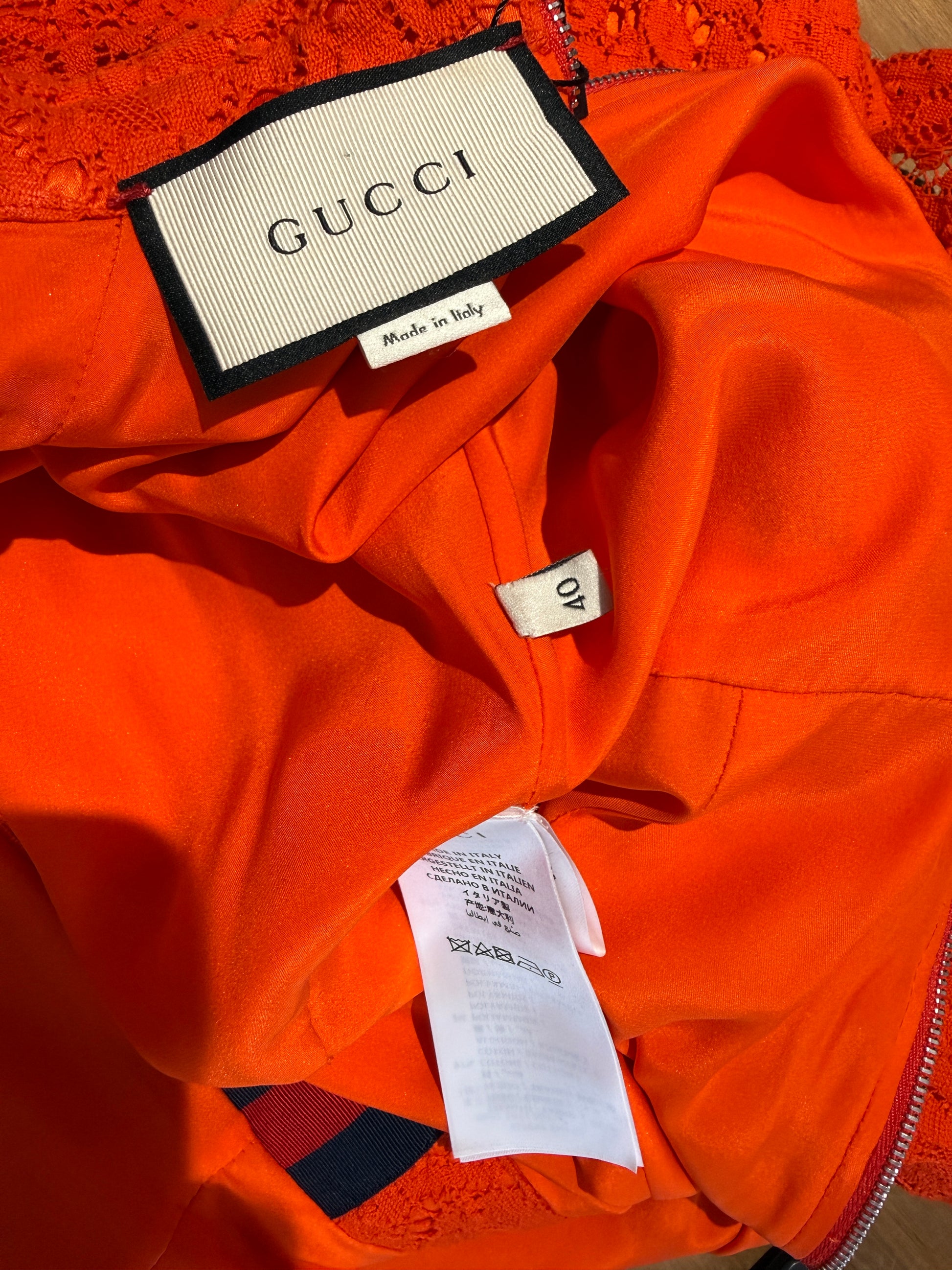Gucci Alessandro Michele - Pre-Fall 2017  - Neon orange guipure dress, rhinestone buttoning, navy and red Web belt
