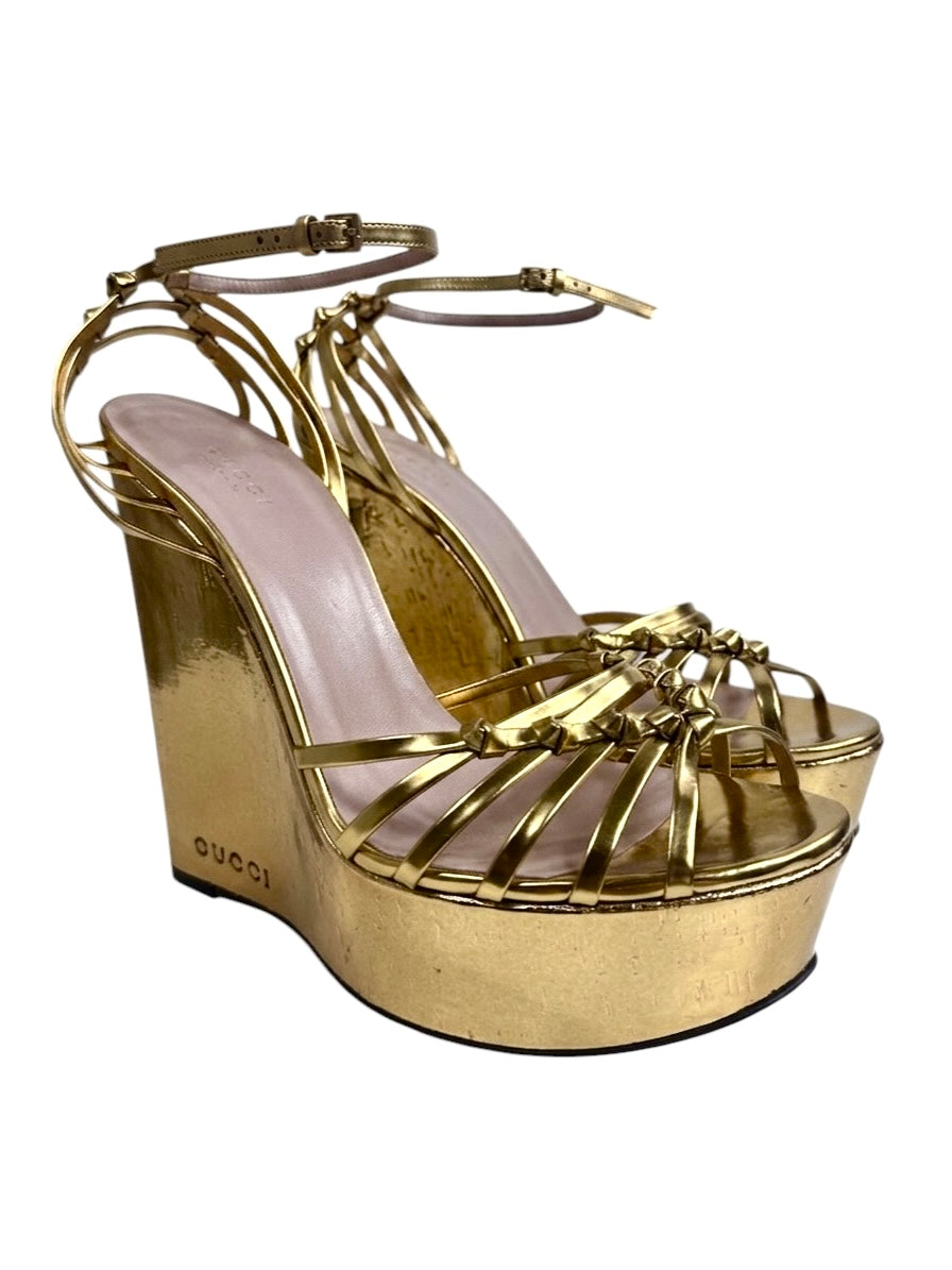 Gucci gold metallic platform 