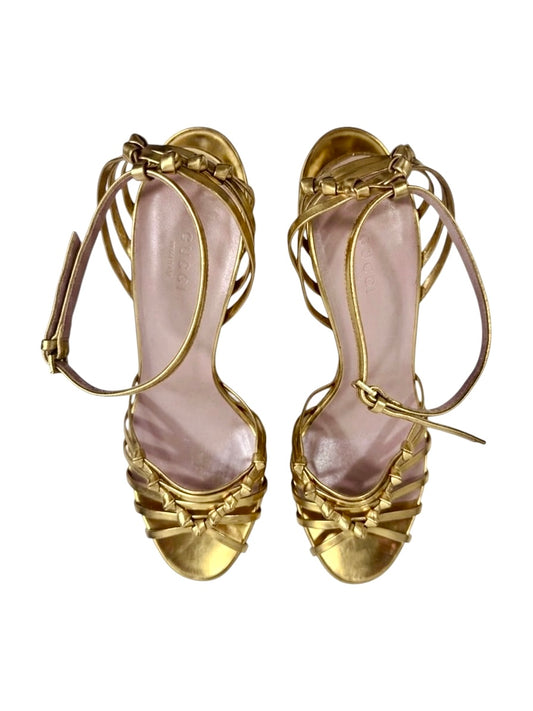 Gucci gold metallic platform 