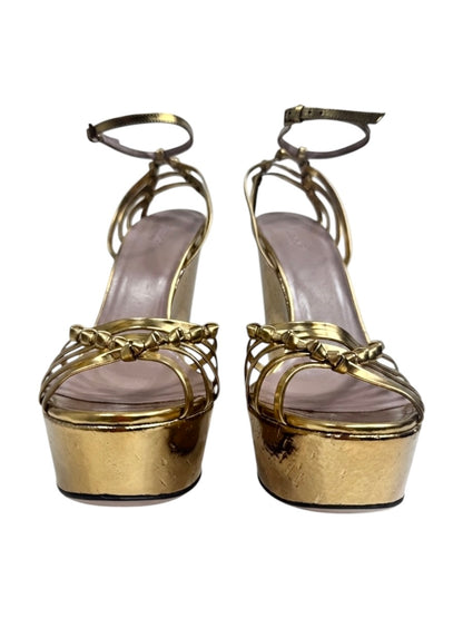 Gucci gold metallic platform 