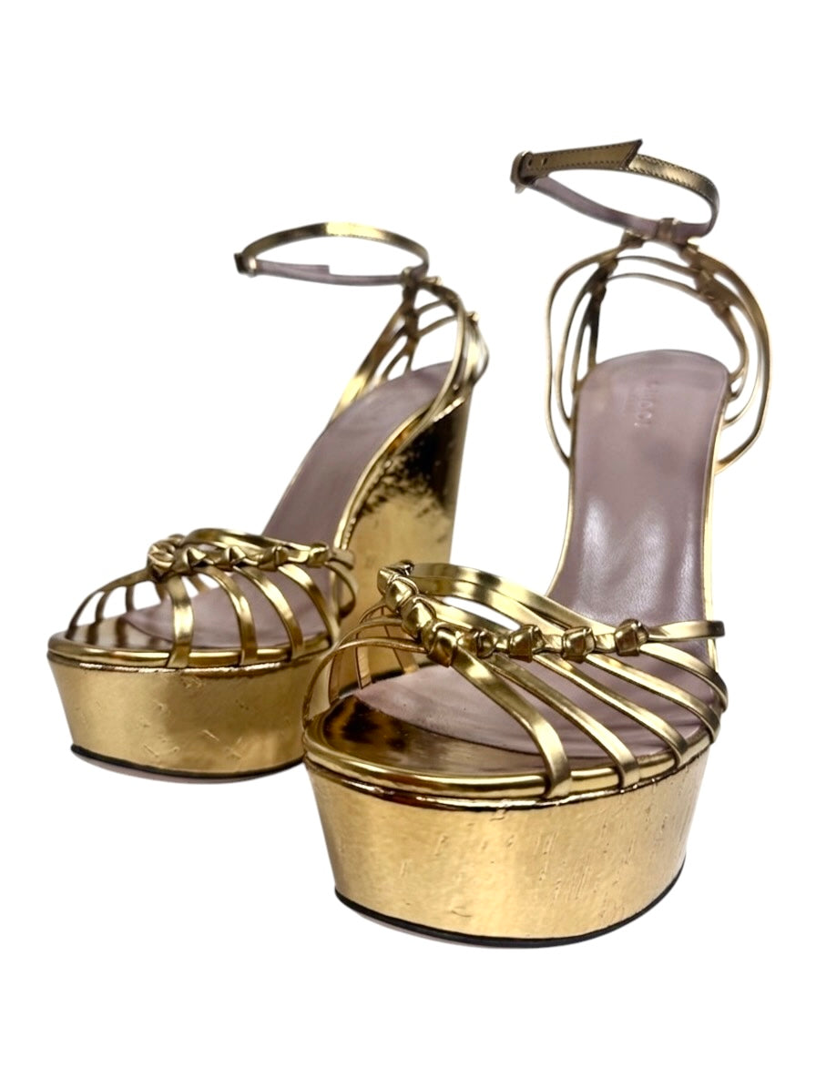 Gucci gold metallic platform 