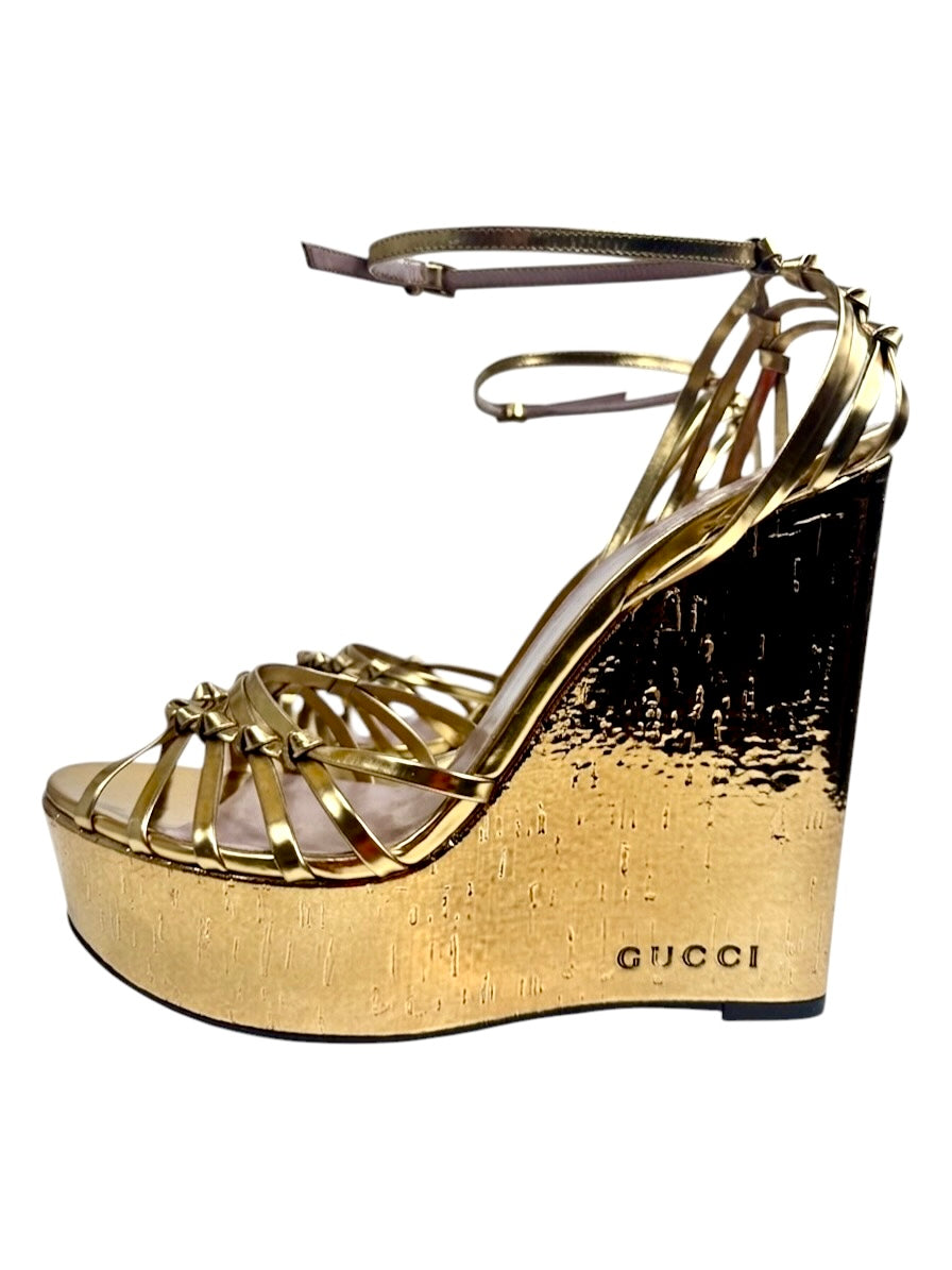Gucci gold metallic platform 