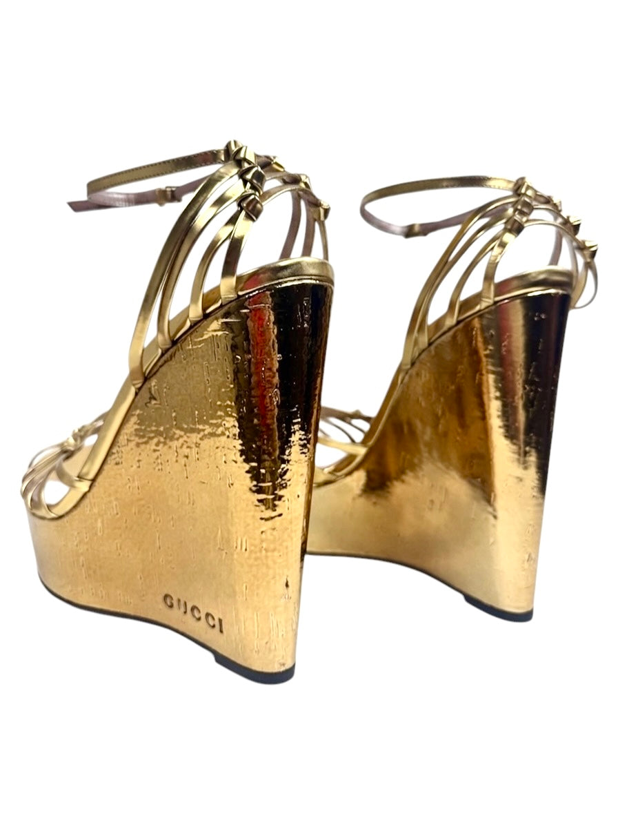 Gucci gold metallic platform 