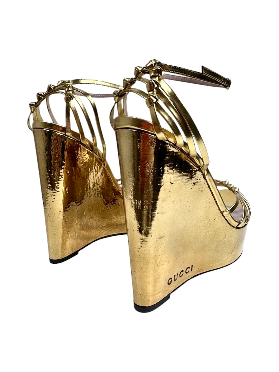 Gucci gold metallic platform 