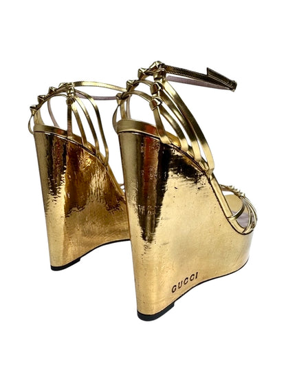 Gucci gold metallic platform 