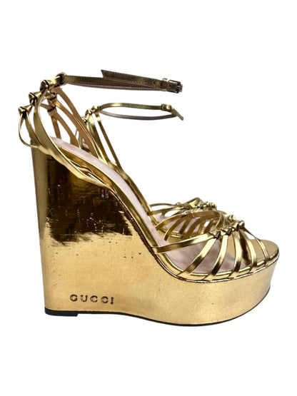Gucci gold metallic platform 