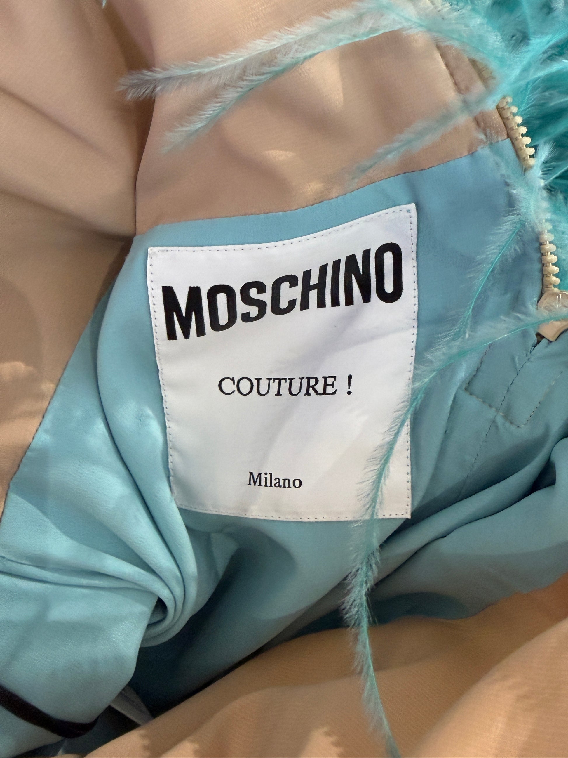 Moschino Couture Jeremy Scott Spring 2021 Look 38 Long bleu silk feathers dress