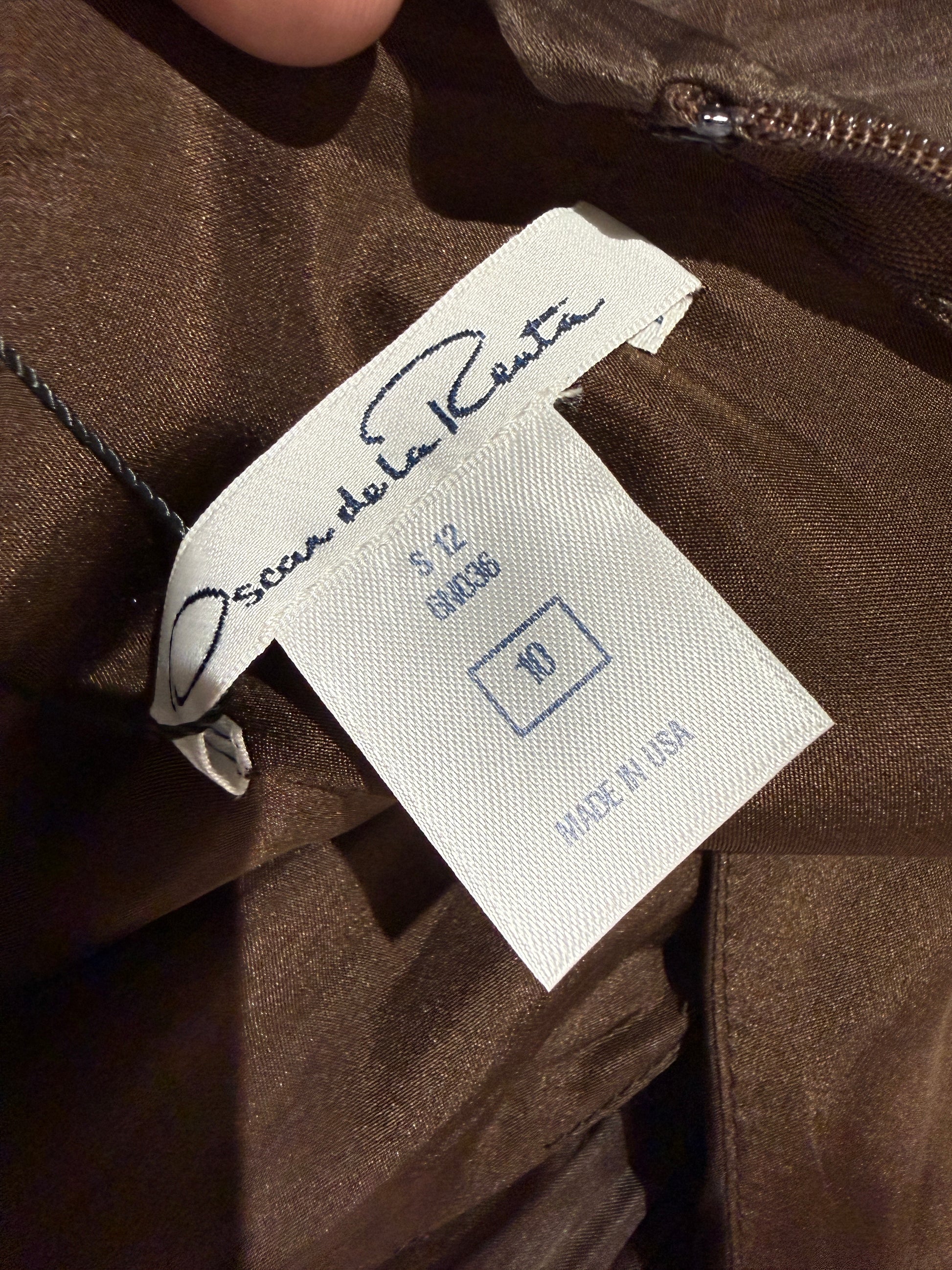 Oscar de la Renta Spring/Summer 2012 Look 46  Long sleeveless dress in pleated cocoa organza 6