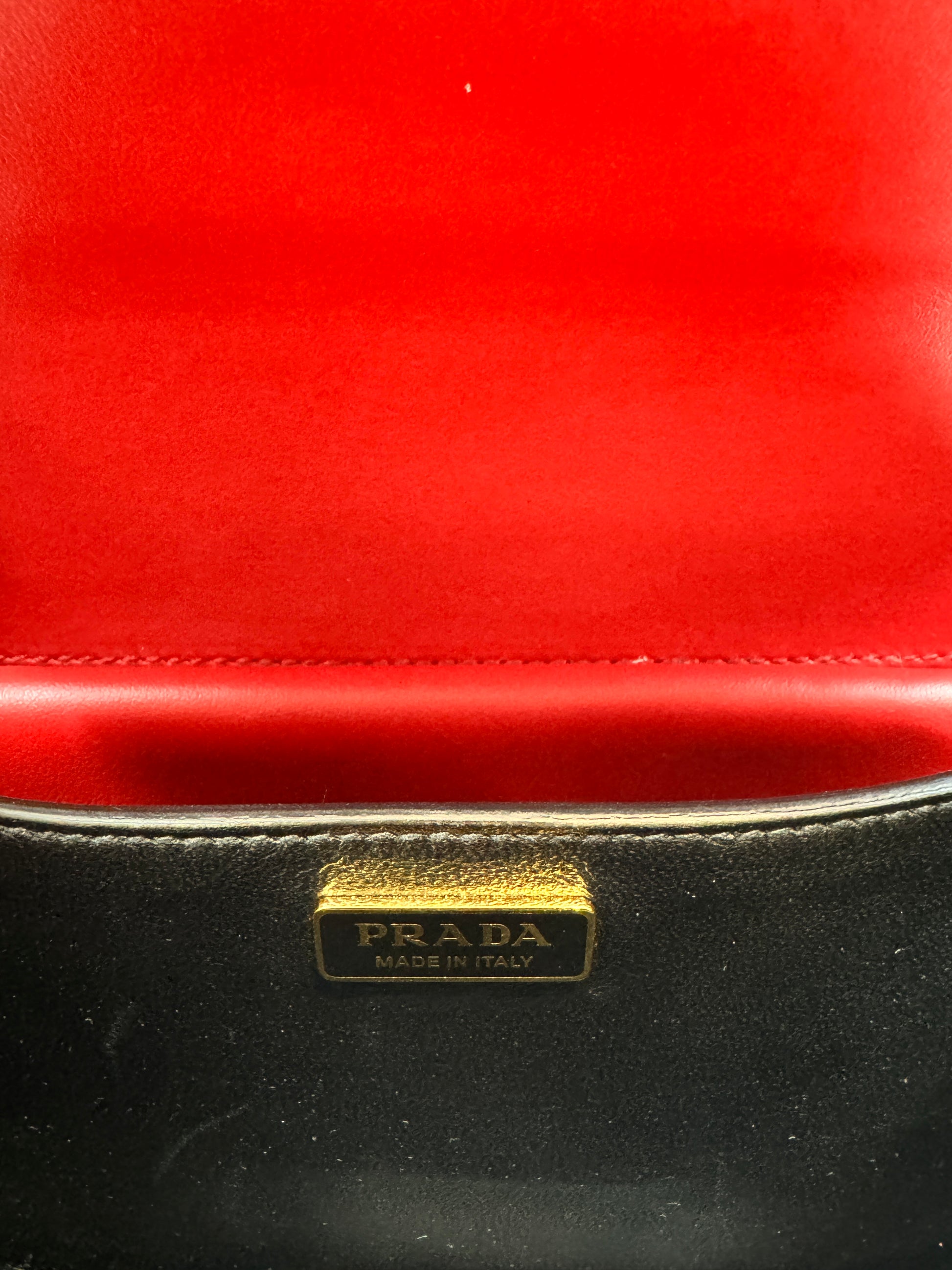 Prada Cahier bag calfskin red black charm