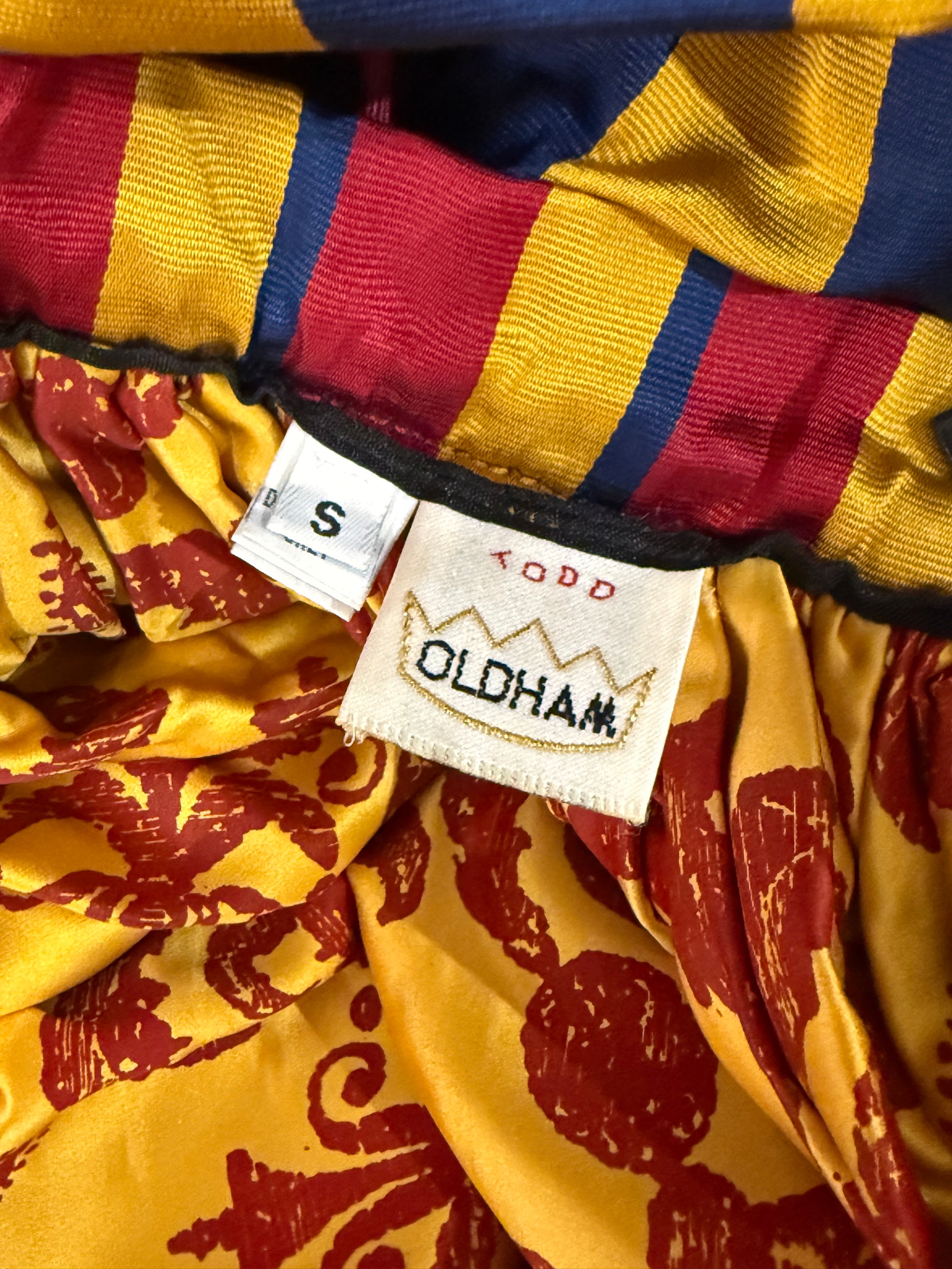 Todd_Oldham_circa_1990_-_Long_overskirt_in_patchwork_of_ottoman_and_multicolored_striped_silk_