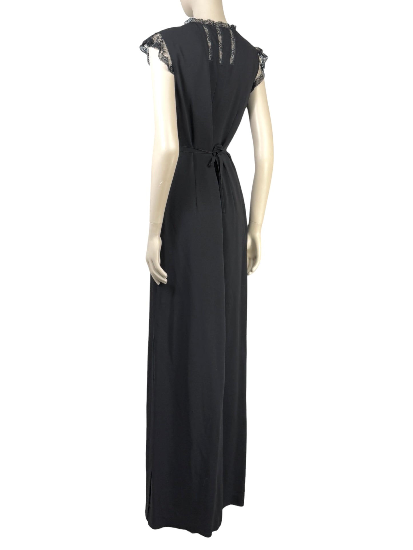 Valentino Roma  Pierpaolo Piccioli & Maria Grazia Chiuri - Spring/Summer 2011  Long sleeveless dress in black crepe, bodice embroidered with small flowers 2