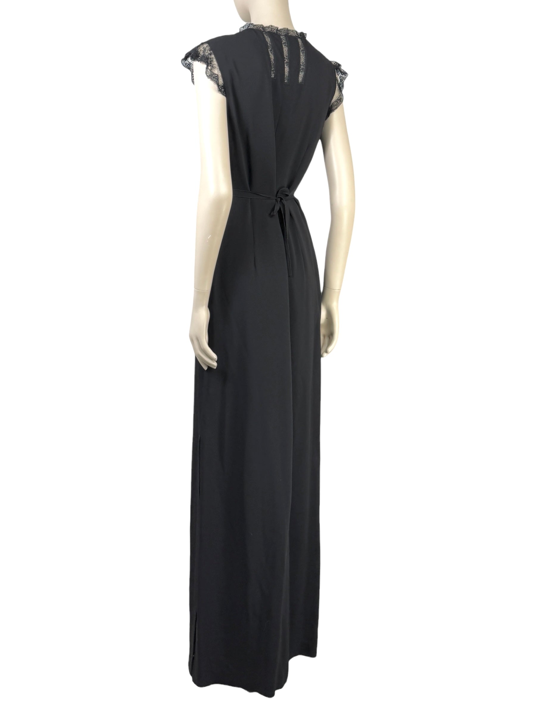 Valentino Roma  Pierpaolo Piccioli & Maria Grazia Chiuri - Spring/Summer 2011  Long sleeveless dress in black crepe, bodice embroidered with small flowers 2