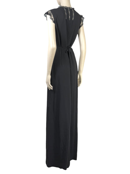 Valentino Roma  Pierpaolo Piccioli & Maria Grazia Chiuri - Spring/Summer 2011  Long sleeveless dress in black crepe, bodice embroidered with small flowers 2