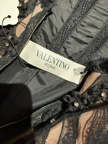 Valentino Roma  Pierpaolo Piccioli & Maria Grazia Chiuri - Spring/Summer 2011  Long sleeveless dress in black crepe, bodice embroidered with small flowers 21