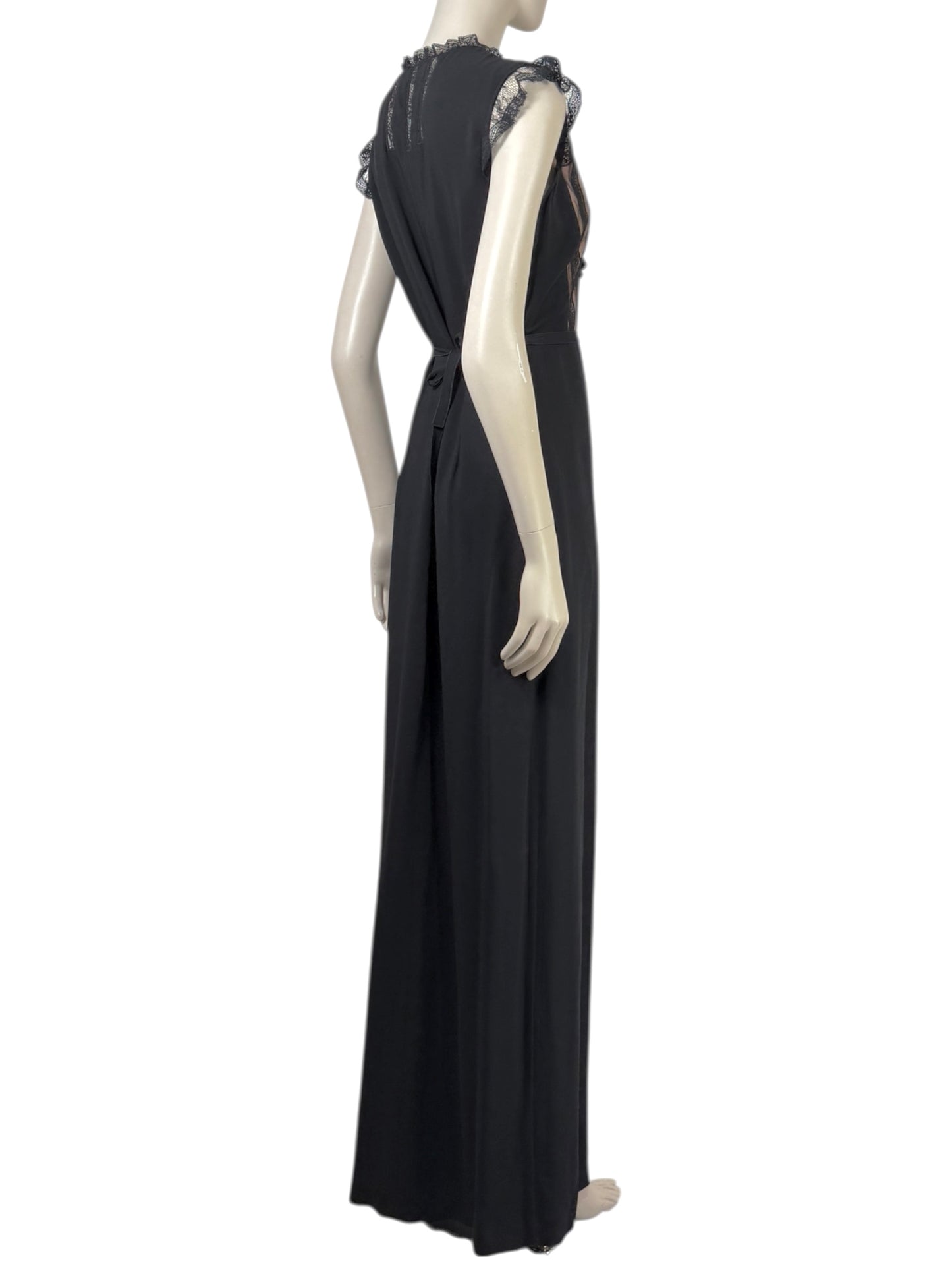 Valentino Roma  Pierpaolo Piccioli & Maria Grazia Chiuri - Spring/Summer 2011  Long sleeveless dress in black crepe, bodice embroidered with small flowers 4