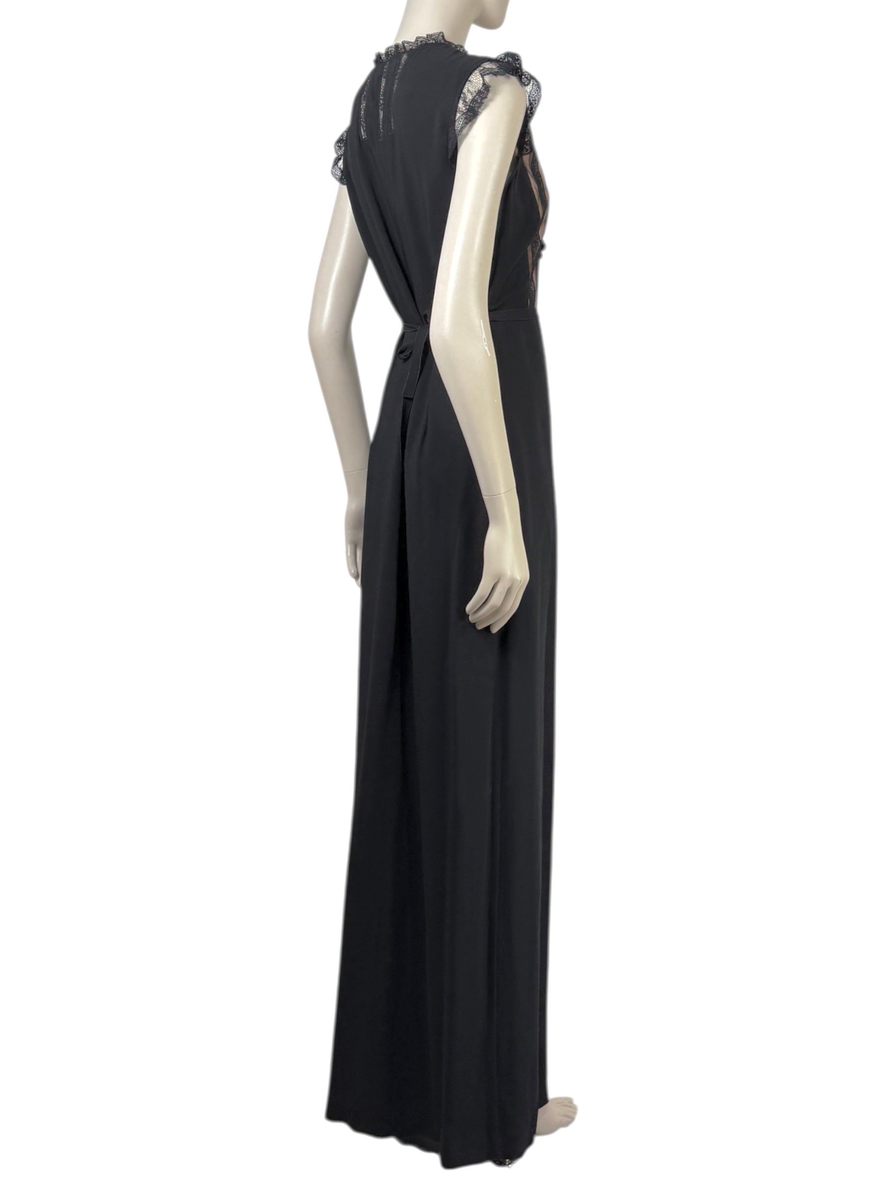 Valentino Roma  Pierpaolo Piccioli & Maria Grazia Chiuri - Spring/Summer 2011  Long sleeveless dress in black crepe, bodice embroidered with small flowers 4